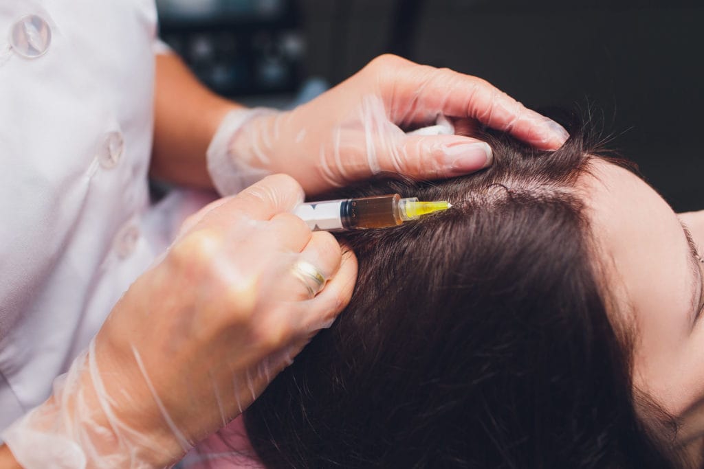 Platelet rich plasma injection procedure. Hair growth stimulation. PRP therapy process.