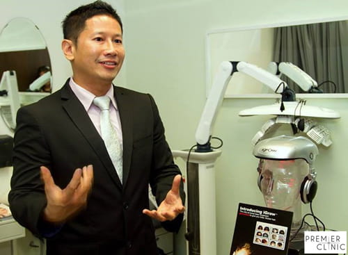Dr.Chen performing Vanquish treatment on patient