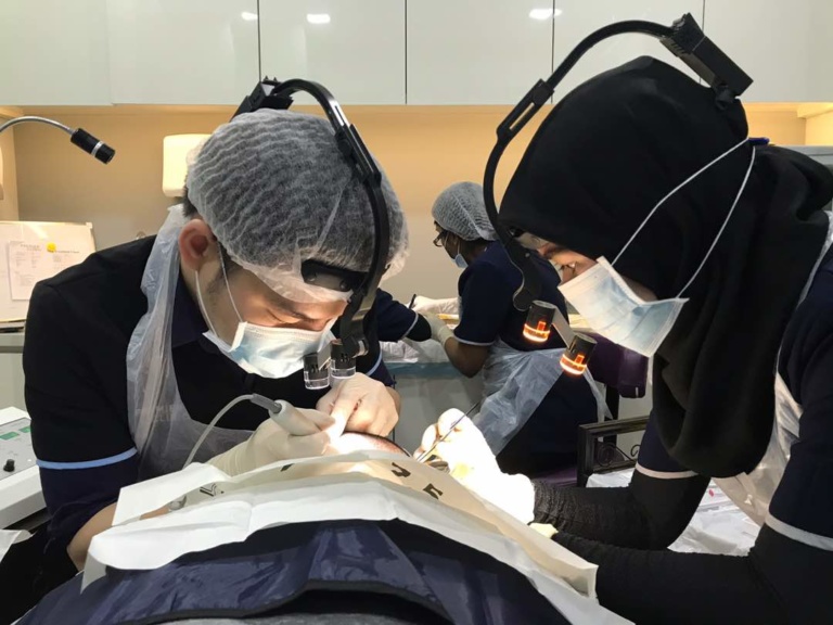DR FOO DOING FUE HAIR TRANSPLANT